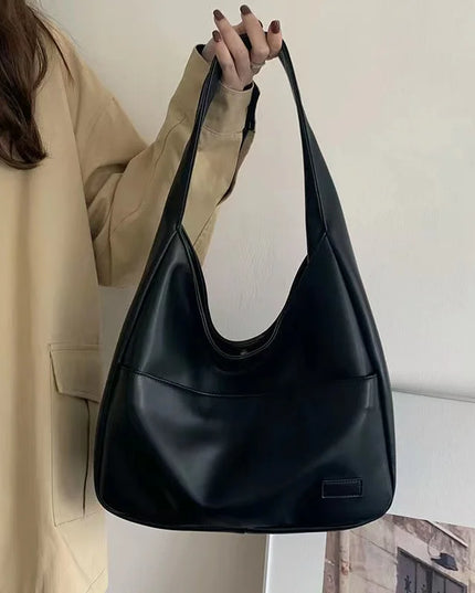 Large capacity tote bag, new black leather simple casual commuting women's bag, fashionable and versatile single shoulder bag