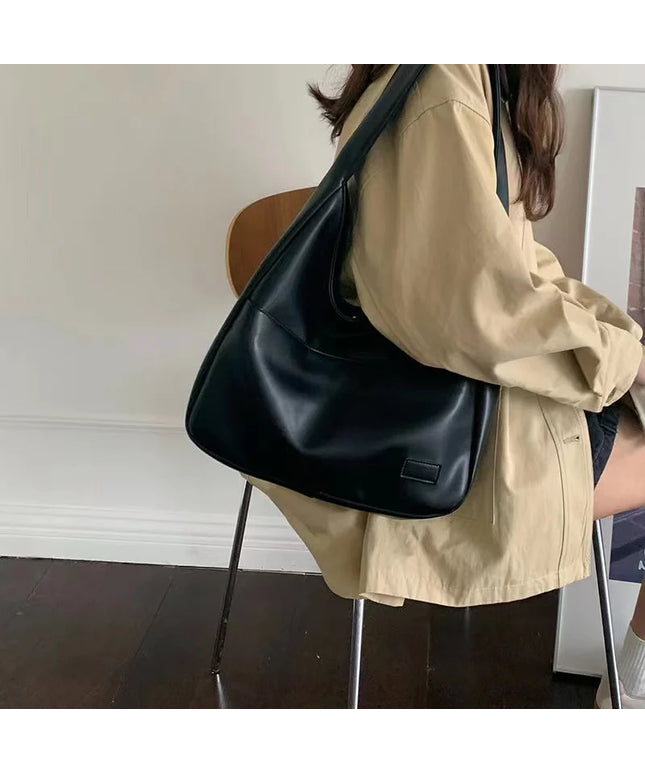 Large capacity tote bag, new black leather simple casual commuting women's bag, fashionable and versatile single shoulder bag