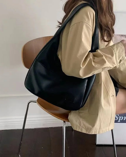 Large capacity tote bag, new black leather simple casual commuting women's bag, fashionable and versatile single shoulder bag